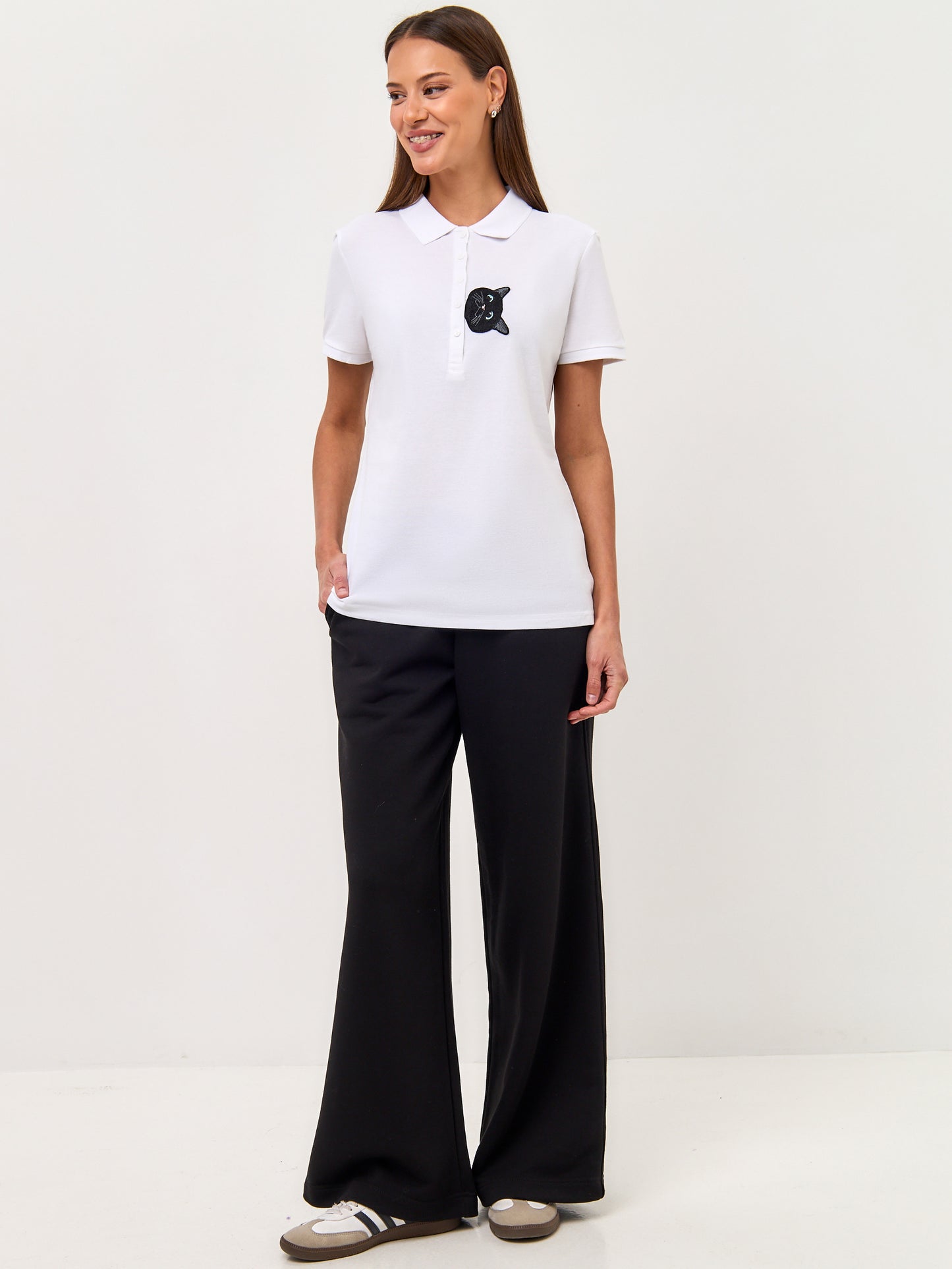 Set: women's white polo shirt with a black cat and black wide-leg sweatpants - Maniita Lacitta