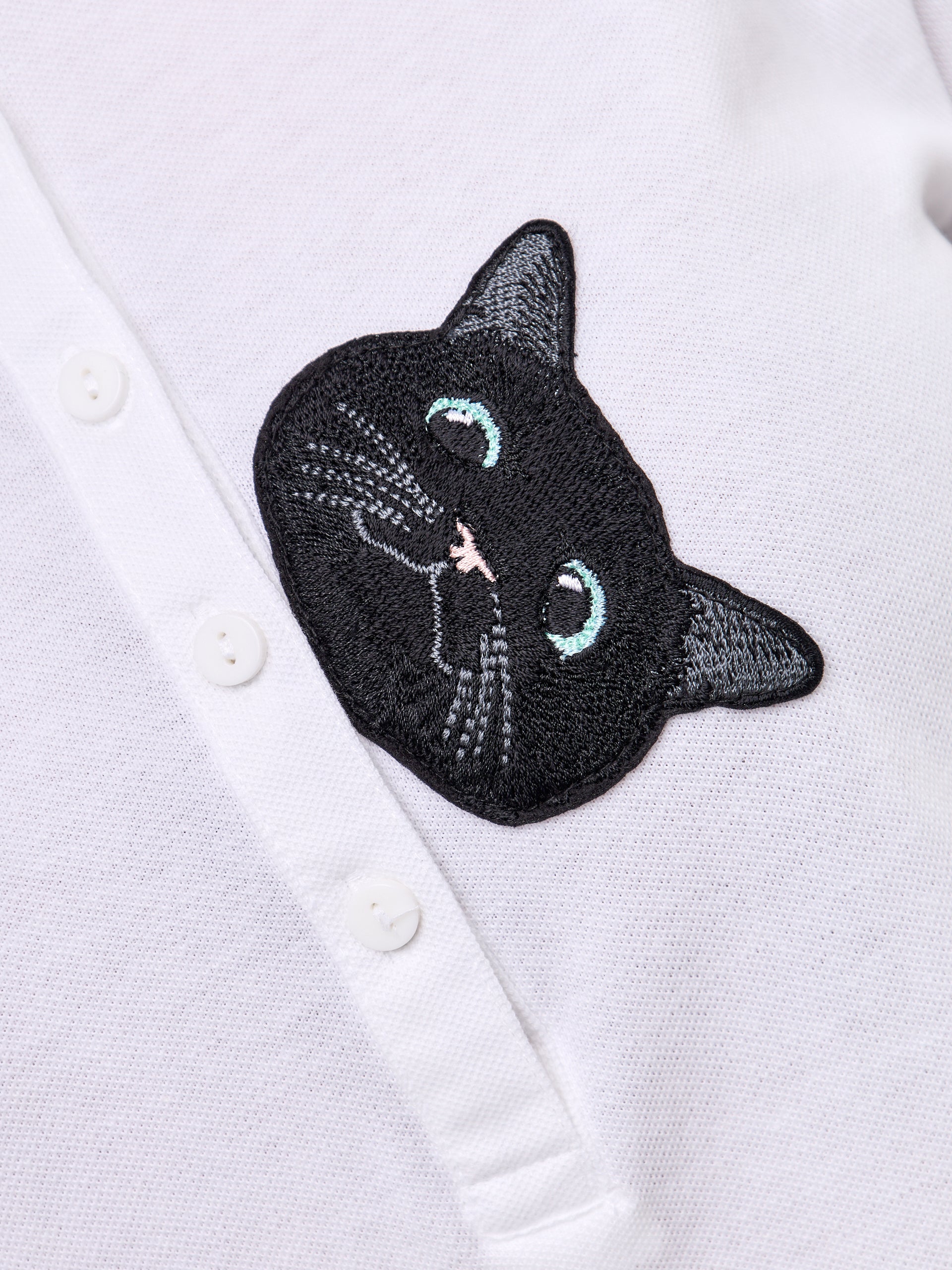 Set: women's white polo shirt with a black cat and black wide-leg sweatpants - Maniita Lacitta